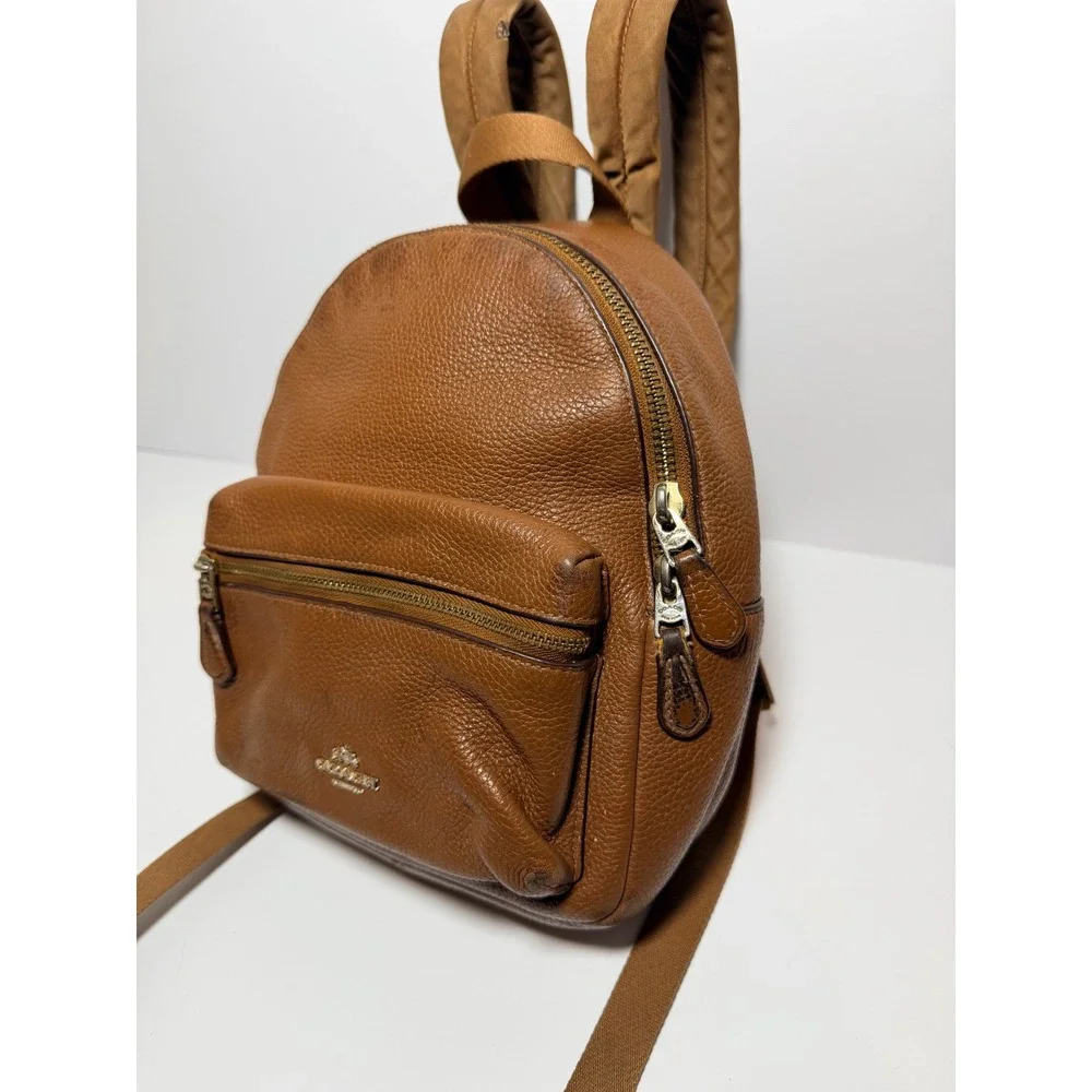 Coach Saddle Leather Mini Charlie Backpack F38263 Pebble Leather Backpack.
